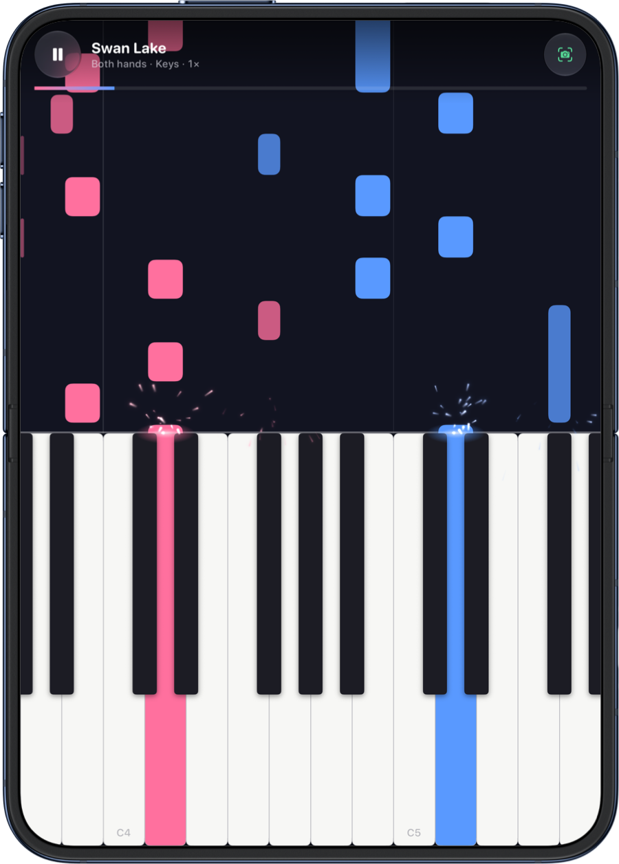 Swan Lake played on PianoDuo's onscreen piano keyboard, notes falling onto the keys in pink and blue